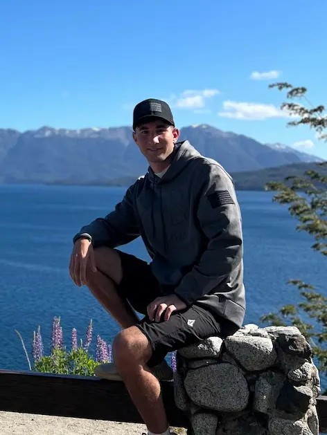 Juan sales team member relaxing by river in Patagonia Argentina