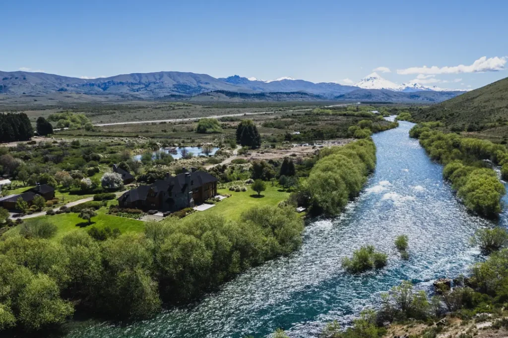 View of river and hills from window at Stone River Lodge