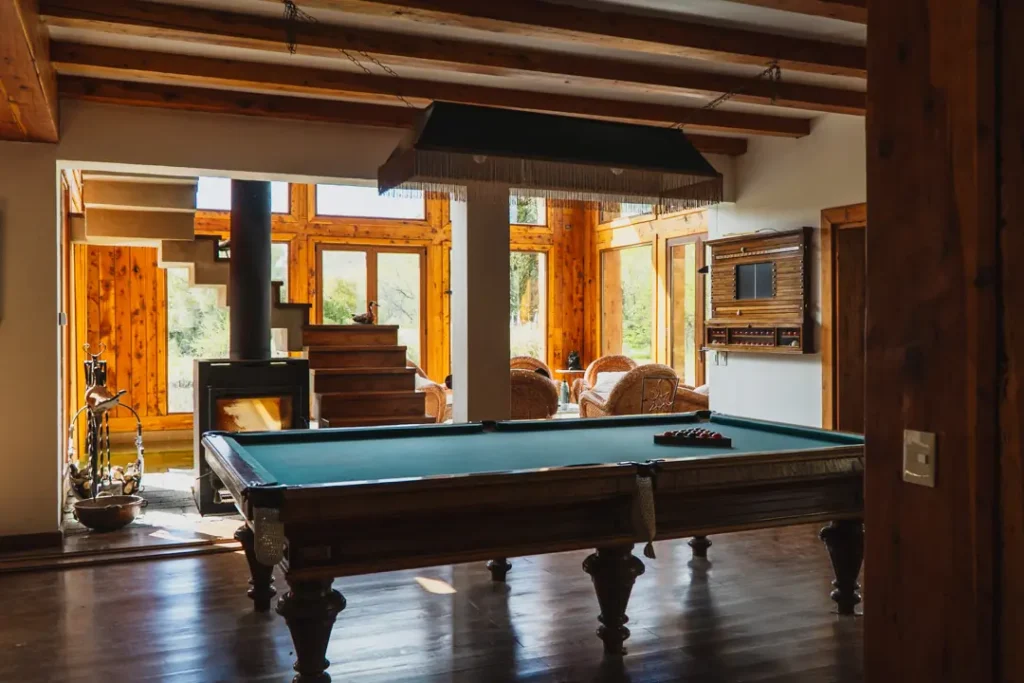 Twin bedroom with rustic decor at luxury Patagonia lodge