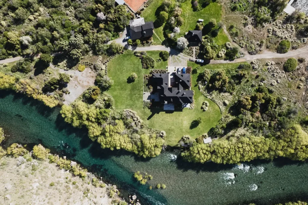 Elegant dining table setup in rustic room at Stone River Lodge